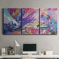 Three-panel canvas wall art featuring expressive abstract with layered color, displayed above a desk in a home office.