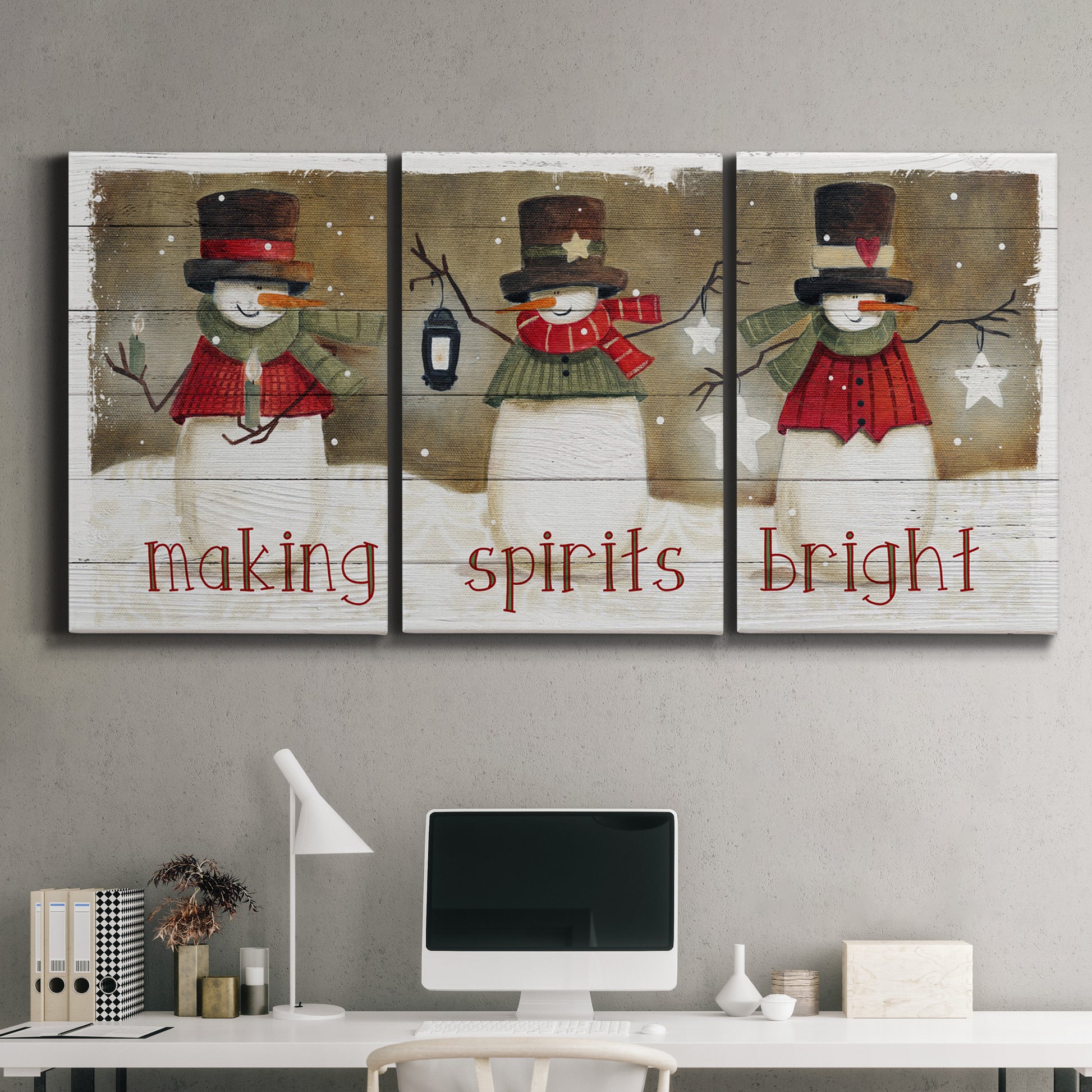 Three-panel canvas wall art featuring misty harbor sunrise with boats, displayed above a desk in a home office.
