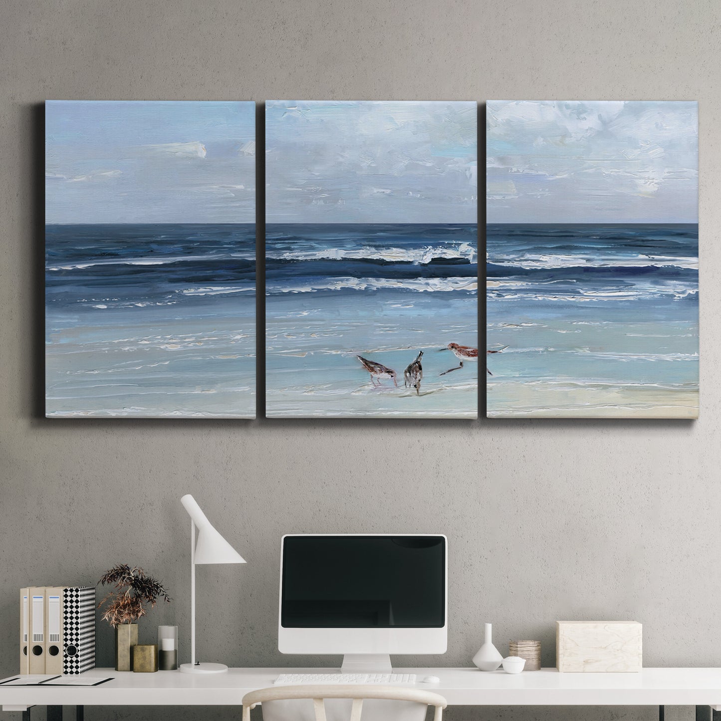 Three-panel canvas wall art featuring loose farmhouse style floral painting, displayed above a desk in a home office.