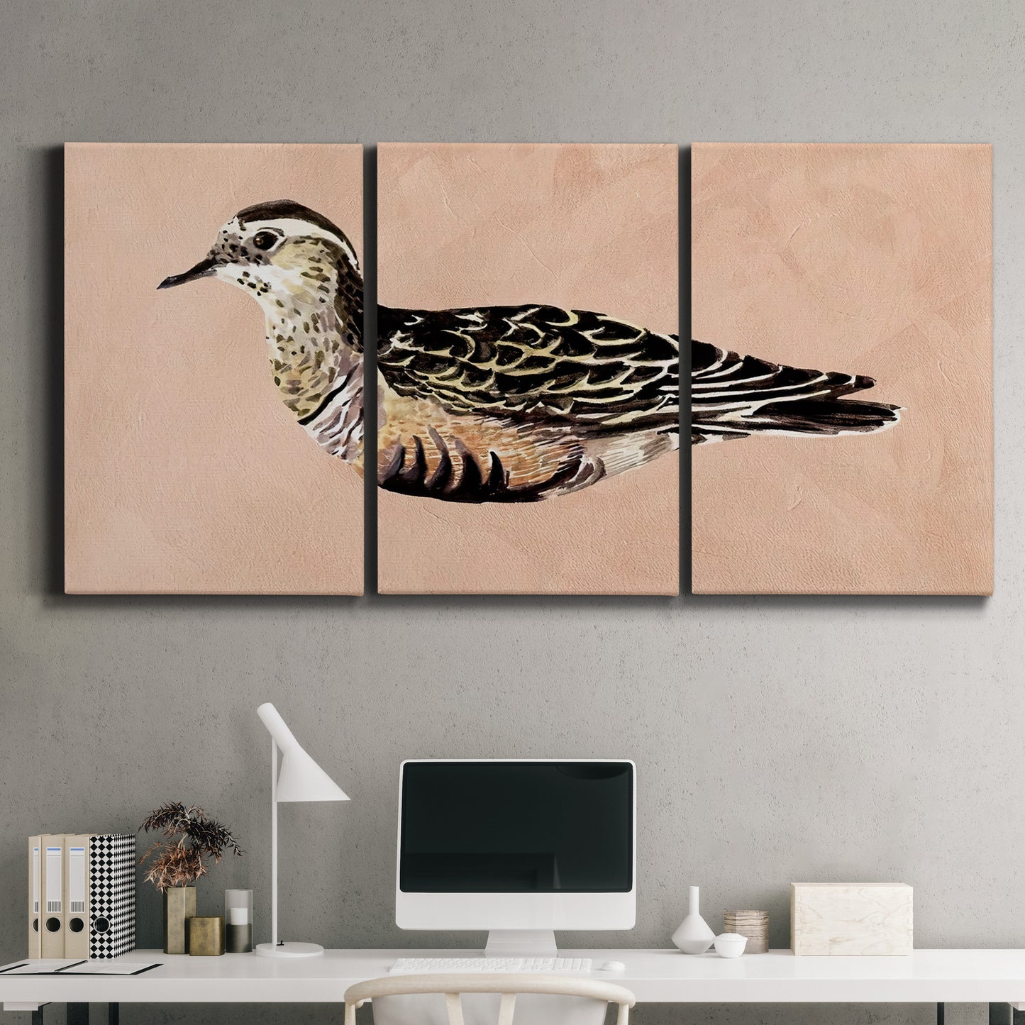 Three-panel canvas wall art featuring coastal bird illustration, displayed above a desk in a home office.