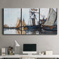 Three-panel canvas wall art featuring fishing boats navigating open water, displayed above a desk in a home office.