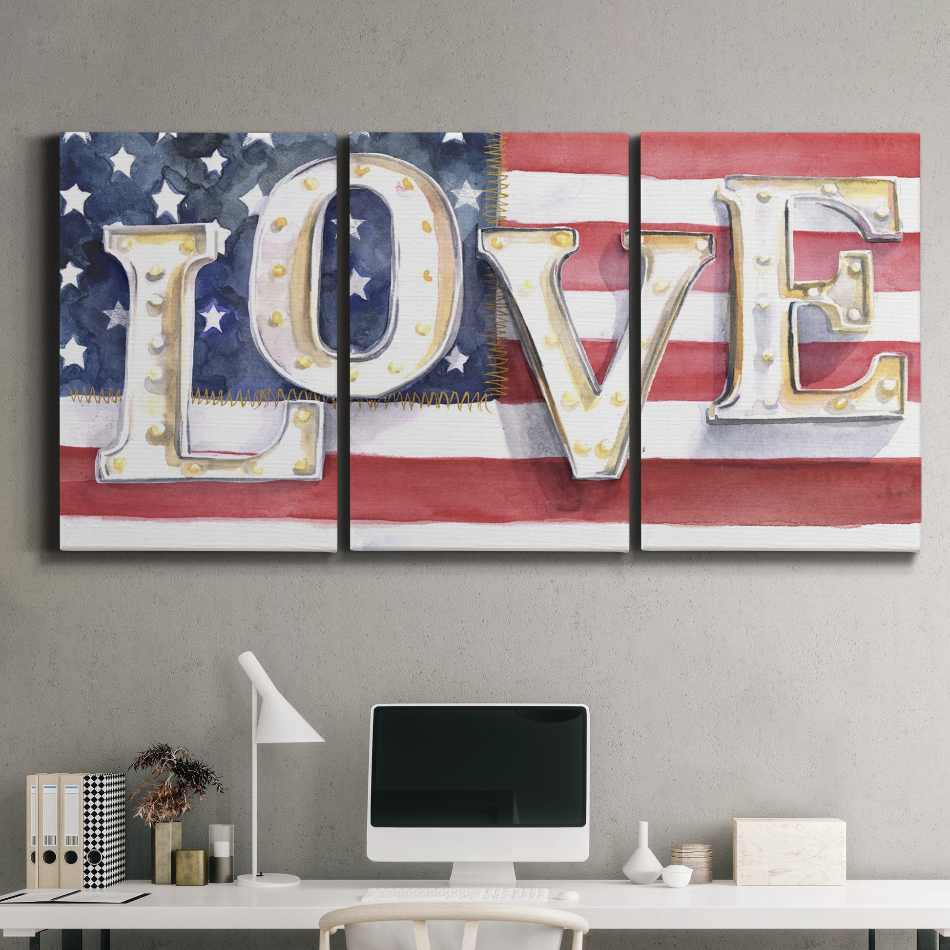 Three-panel canvas wall art featuring patriotic rustic typography art, displayed above a desk in a home office.