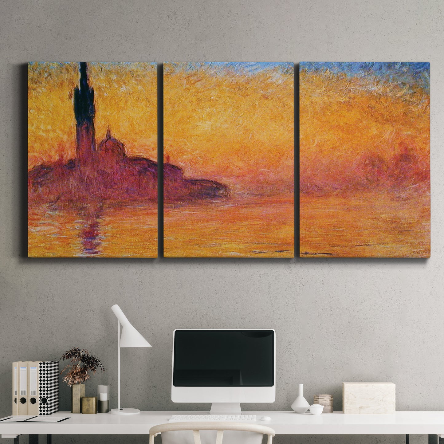 Three-panel canvas wall art featuring venetian church at twilight, displayed above a desk in a home office.