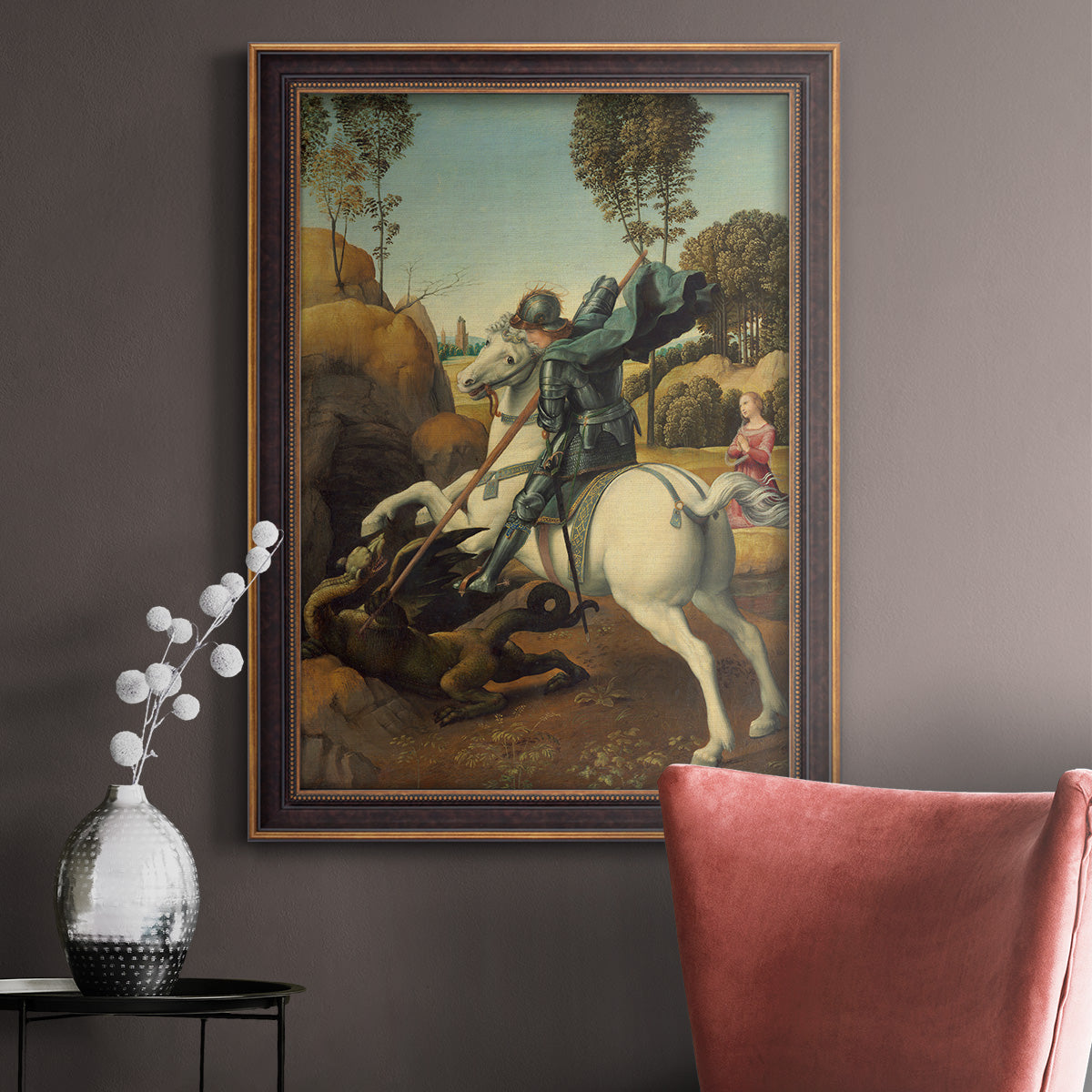 Religious painting of Saint George slaying the dragon by Raphael in an ornate bronzed mahogany wood frame displayed in a neutral interior setting.