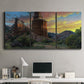 Three-panel canvas wall art featuring dramatic canyon landscape at dusk, displayed above a desk in a home office.