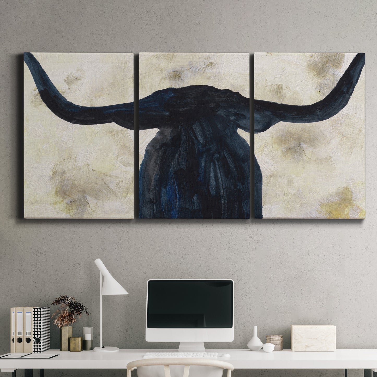 Three-panel canvas wall art featuring rustic animal portrait illustration, displayed above a desk in a home office.