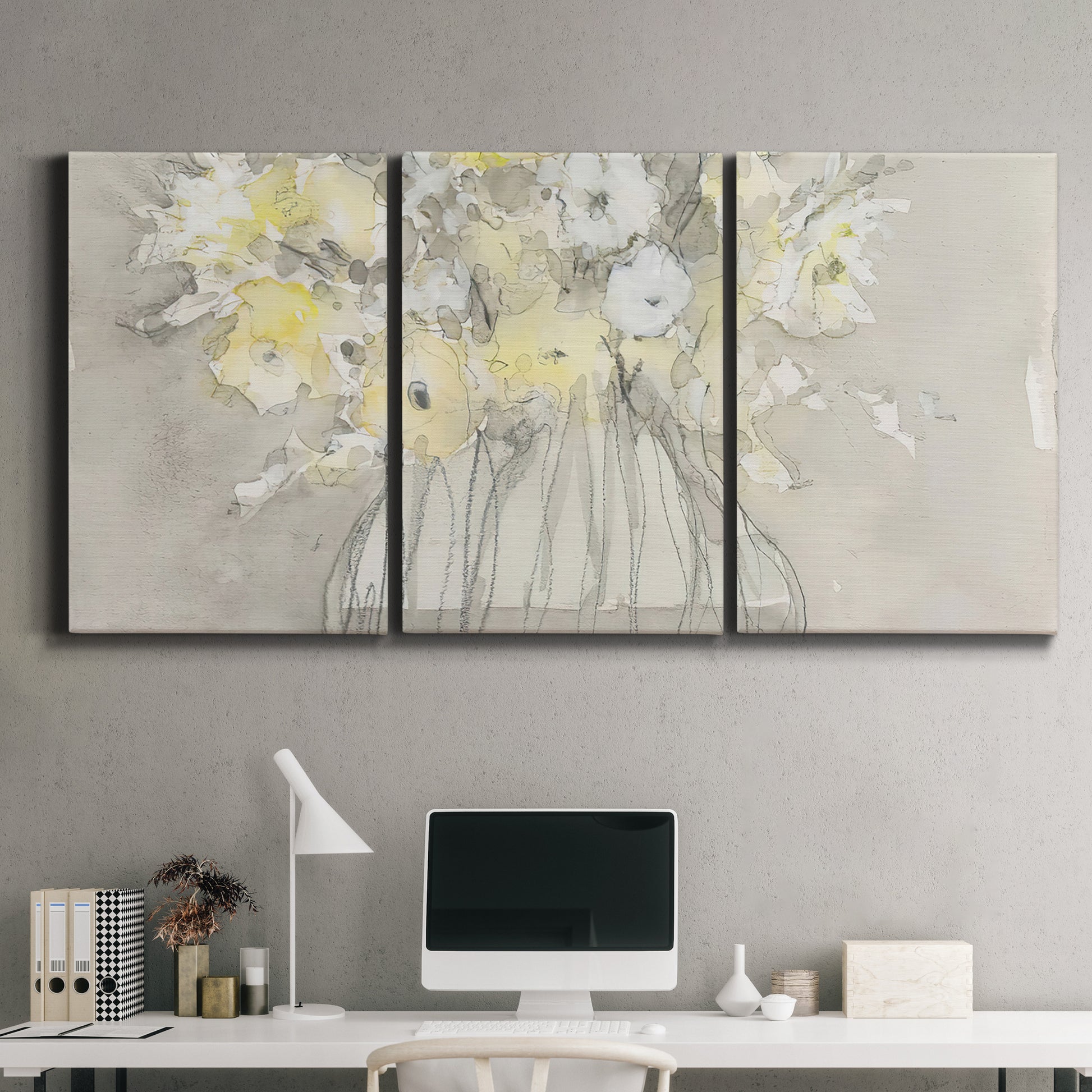 Three-panel canvas wall art featuring vintage floral abstract composition, displayed above a desk in a home office.