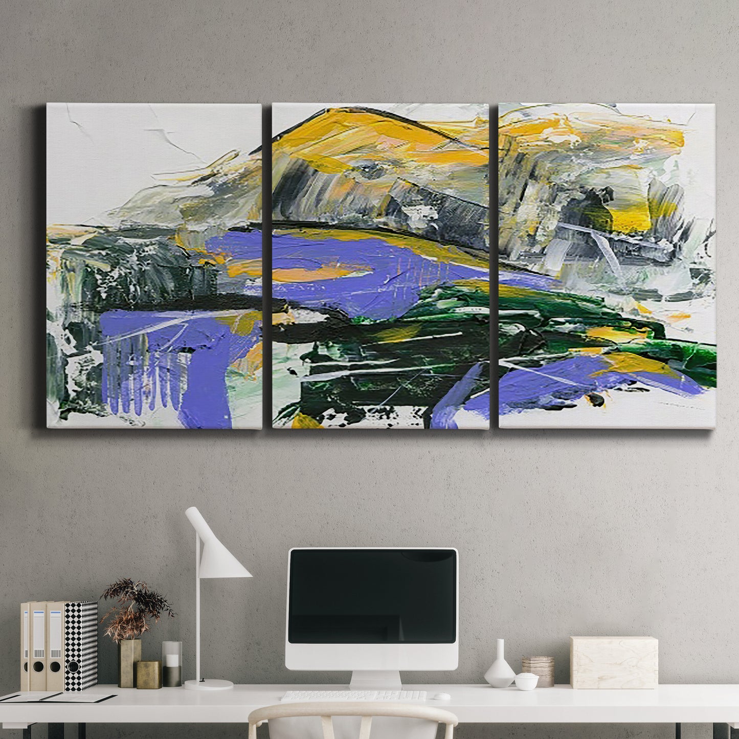 Three-panel canvas wall art featuring quiet abstract mountain silhouette, displayed above a desk in a home office.