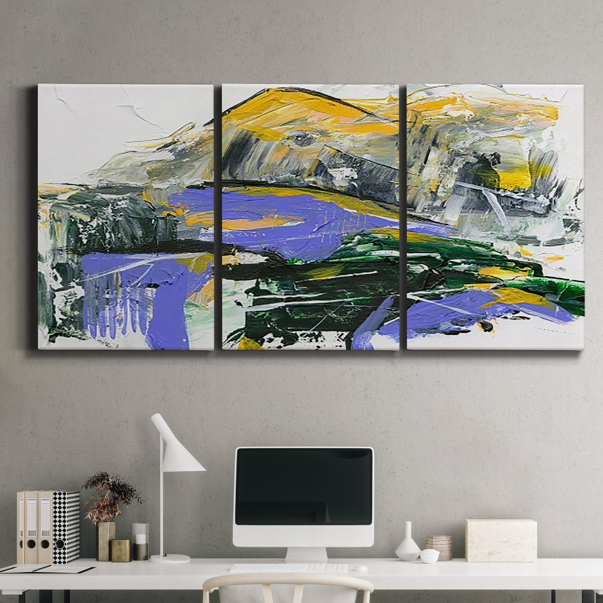 Three-panel canvas wall art featuring quiet abstract mountain silhouette, displayed above a desk in a home office.