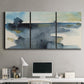 Three-panel canvas wall art featuring abstract watercolor with upward motion, displayed above a desk in a home office.