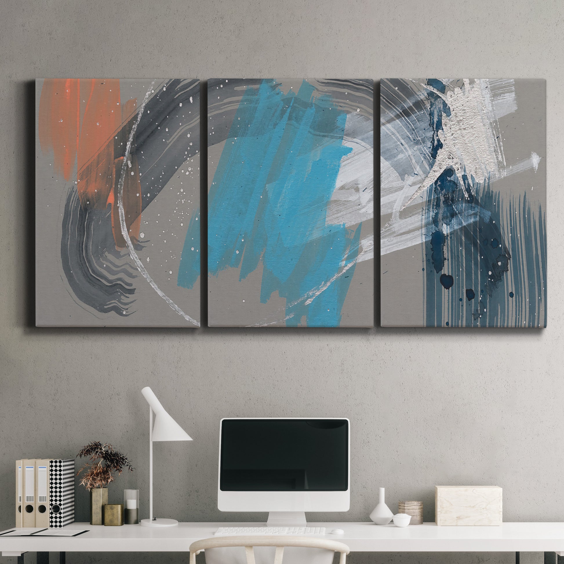 Three-panel canvas wall art featuring playful abstract mark making, displayed above a desk in a home office.