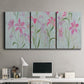 Three-panel canvas wall art featuring pink floral trio arrangement, displayed above a desk in a home office.
