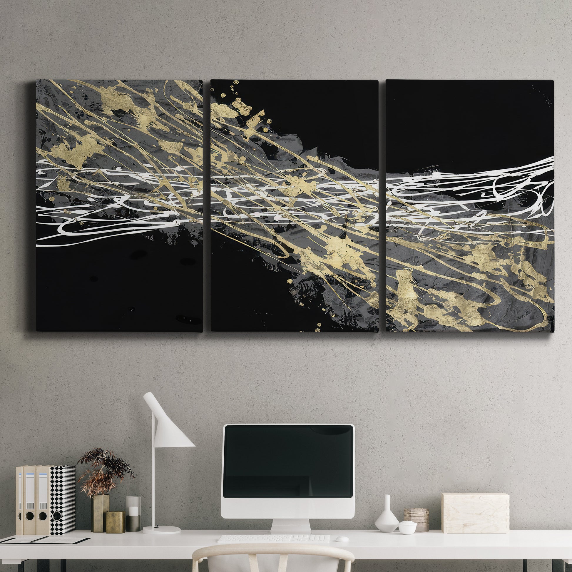 Three-panel canvas wall art featuring dark modern abstract wind patterns, displayed above a desk in a home office.