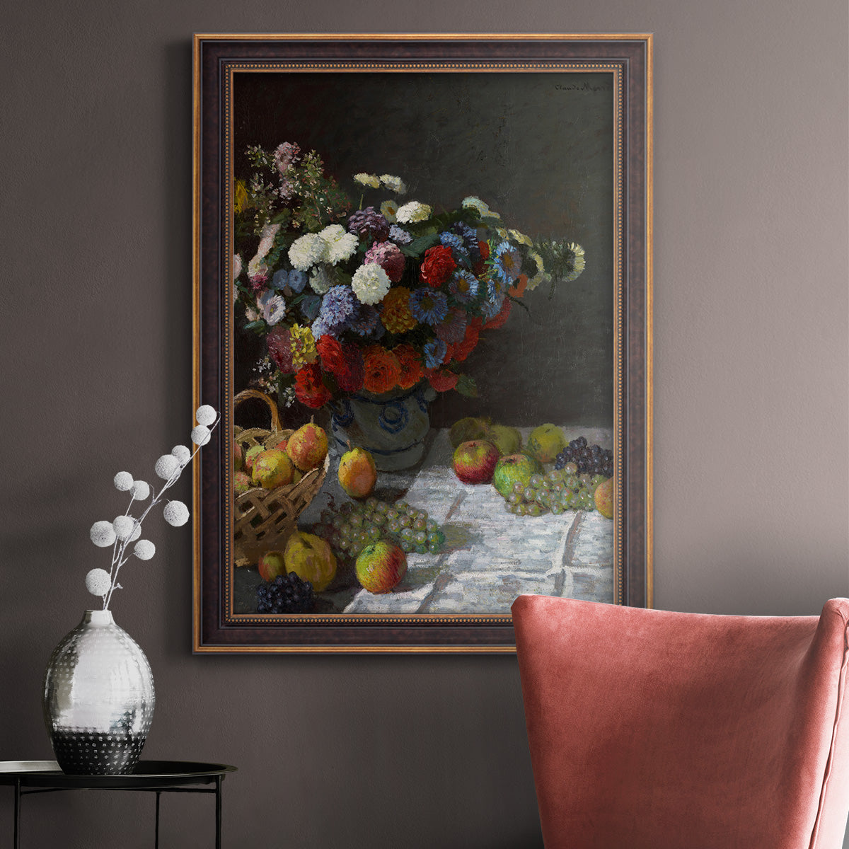 Impressionist floral still life painting by Claude Monet in an ornate bronzed mahogany wood frame displayed in a neutral interior setting.