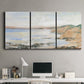 Three-panel canvas wall art featuring coastal shoreline landscape study, displayed above a desk in a home office.