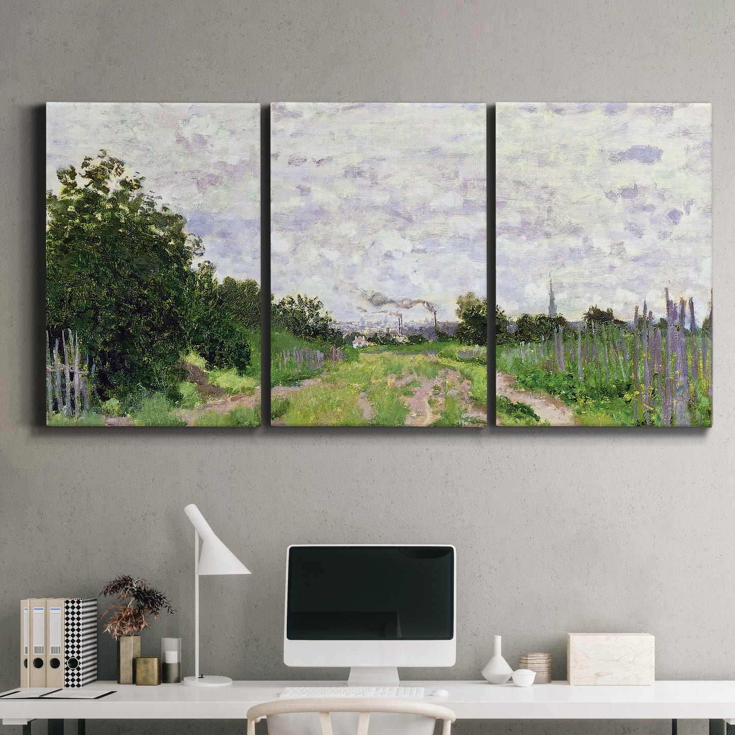 Three-panel canvas wall art featuring spring landscape with blossoming trees, displayed above a desk in a home office.