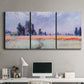 Three-panel canvas wall art featuring flowering field with poppies, displayed above a desk in a home office.