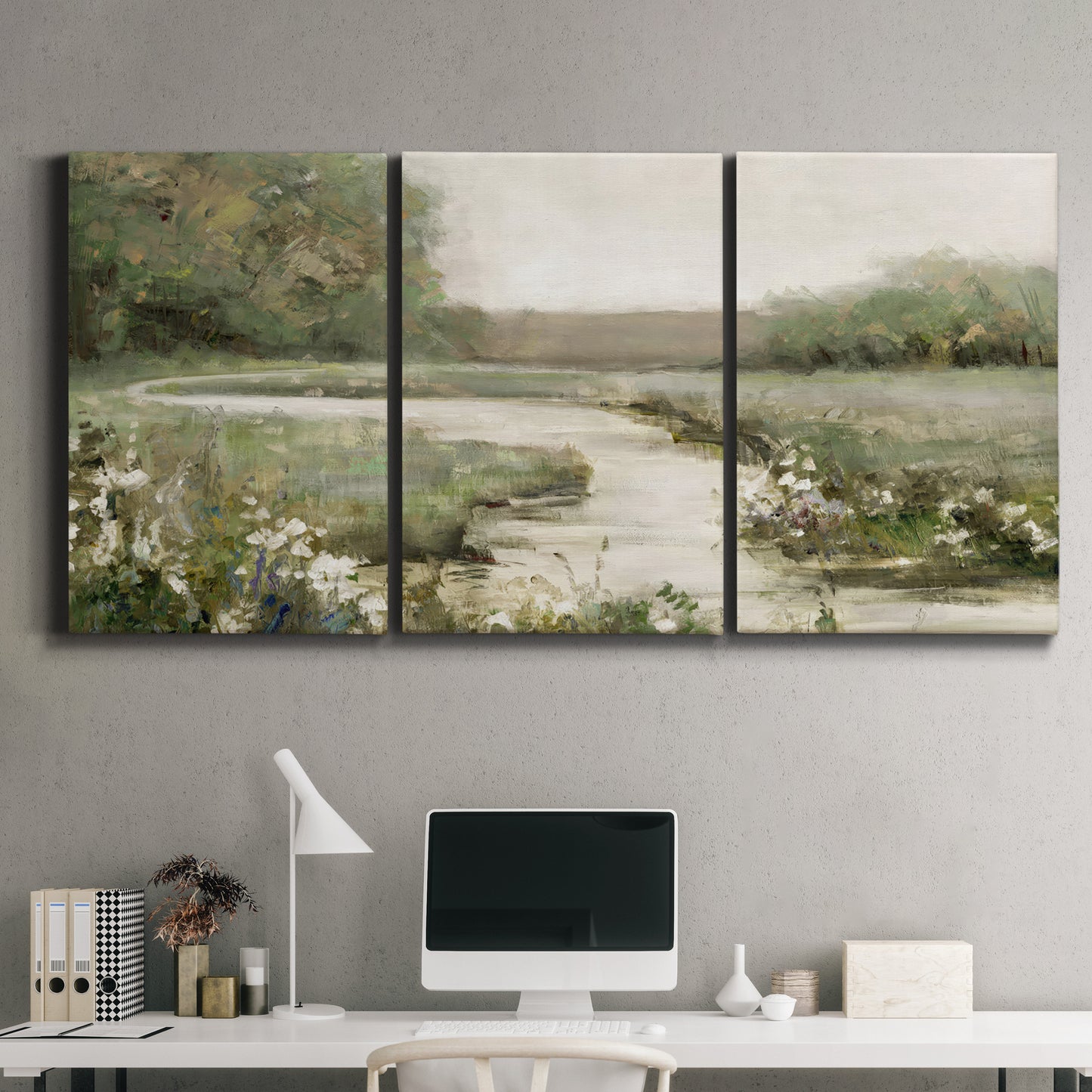 Three-panel canvas wall art featuring narrow path through quiet landscape, displayed above a desk in a home office.