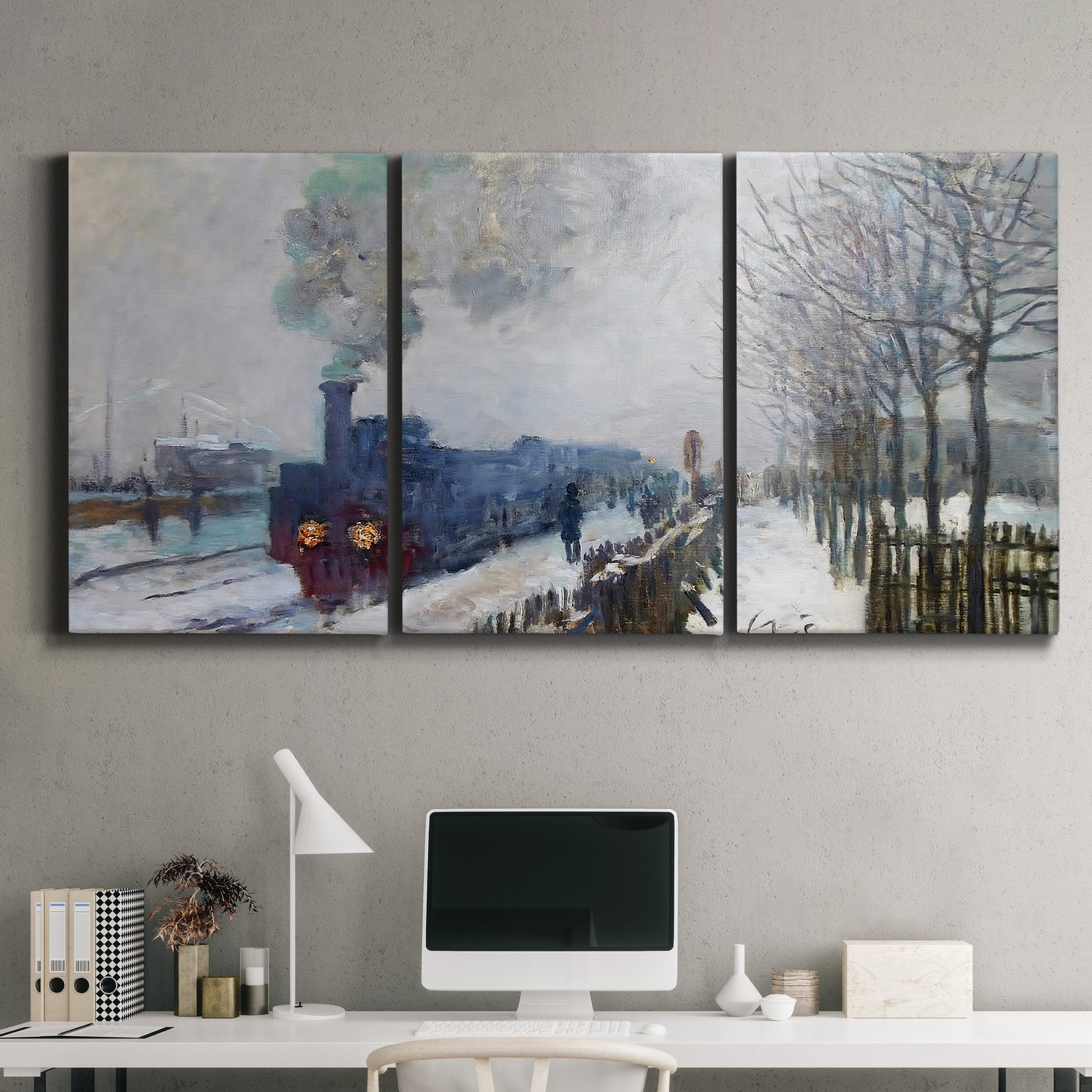 Three-panel canvas wall art featuring steam train in snowy landscape, displayed above a desk in a home office.