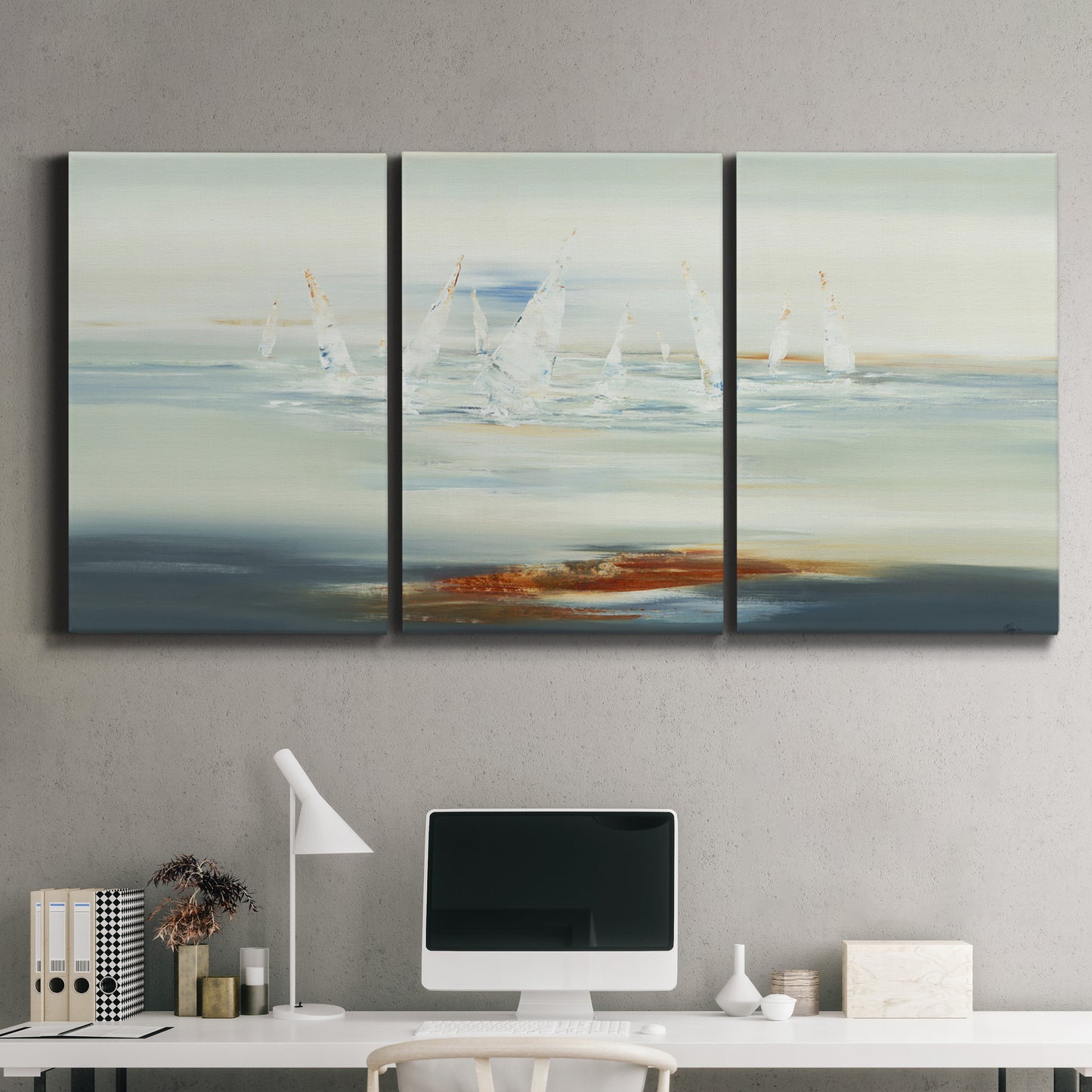 Three-panel canvas wall art featuring nautical abstract suggesting drifting calm, displayed above a desk in a home office.