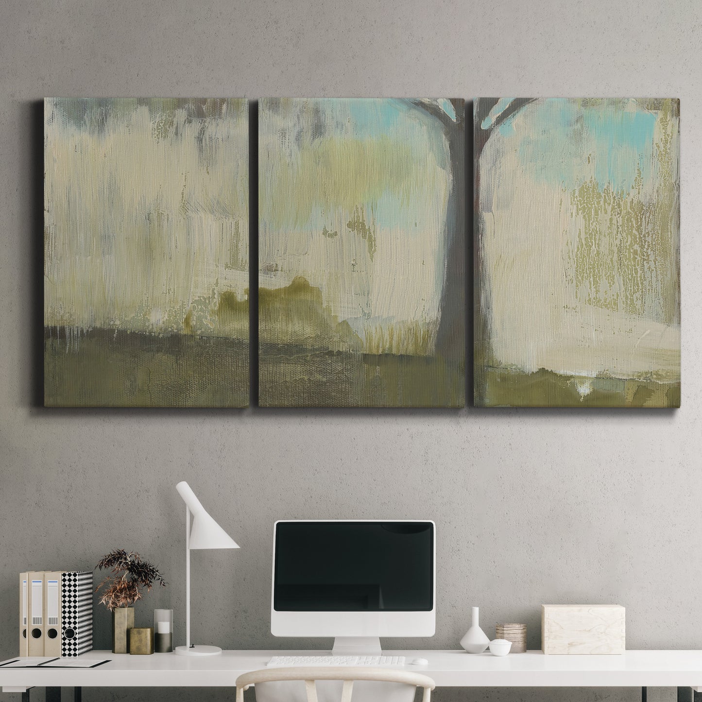 Three-panel canvas wall art featuring tall abstract tree form, displayed above a desk in a home office.