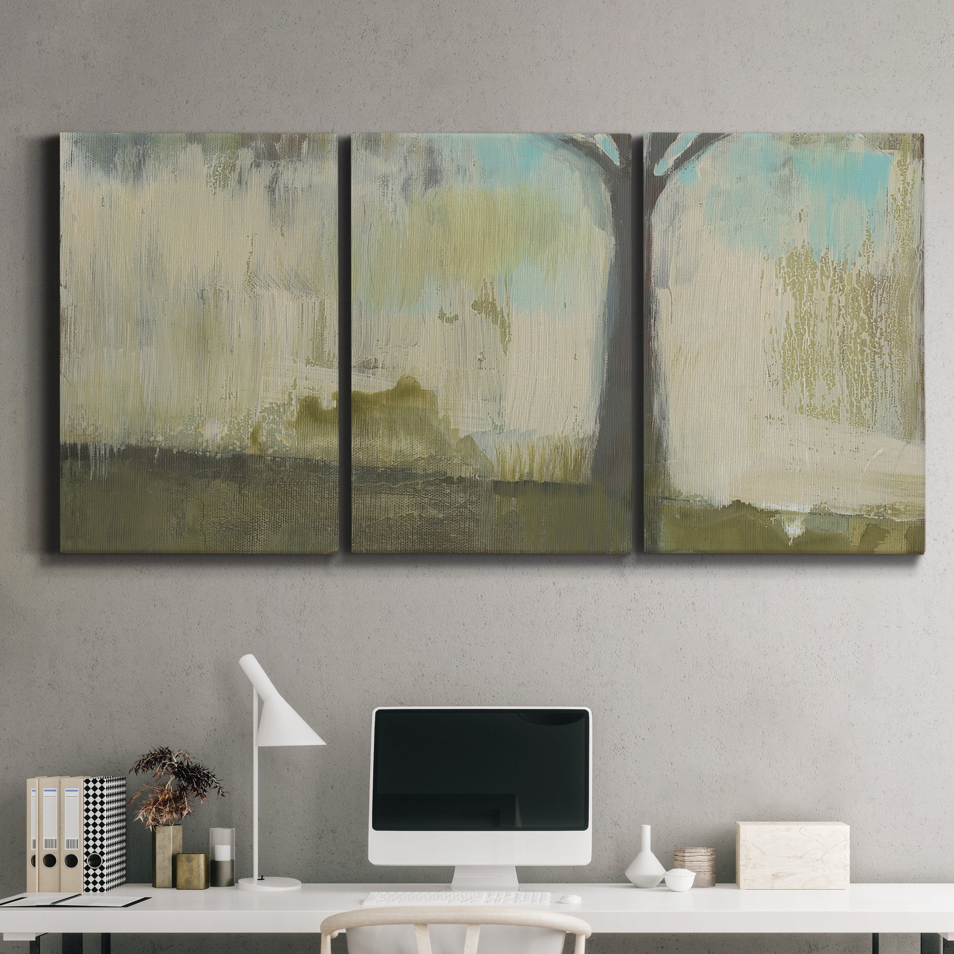 Three-panel canvas wall art featuring tall abstract tree form, displayed above a desk in a home office.