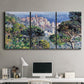 Three-panel canvas wall art featuring coastal hillside overlooking monaco, displayed above a desk in a home office.