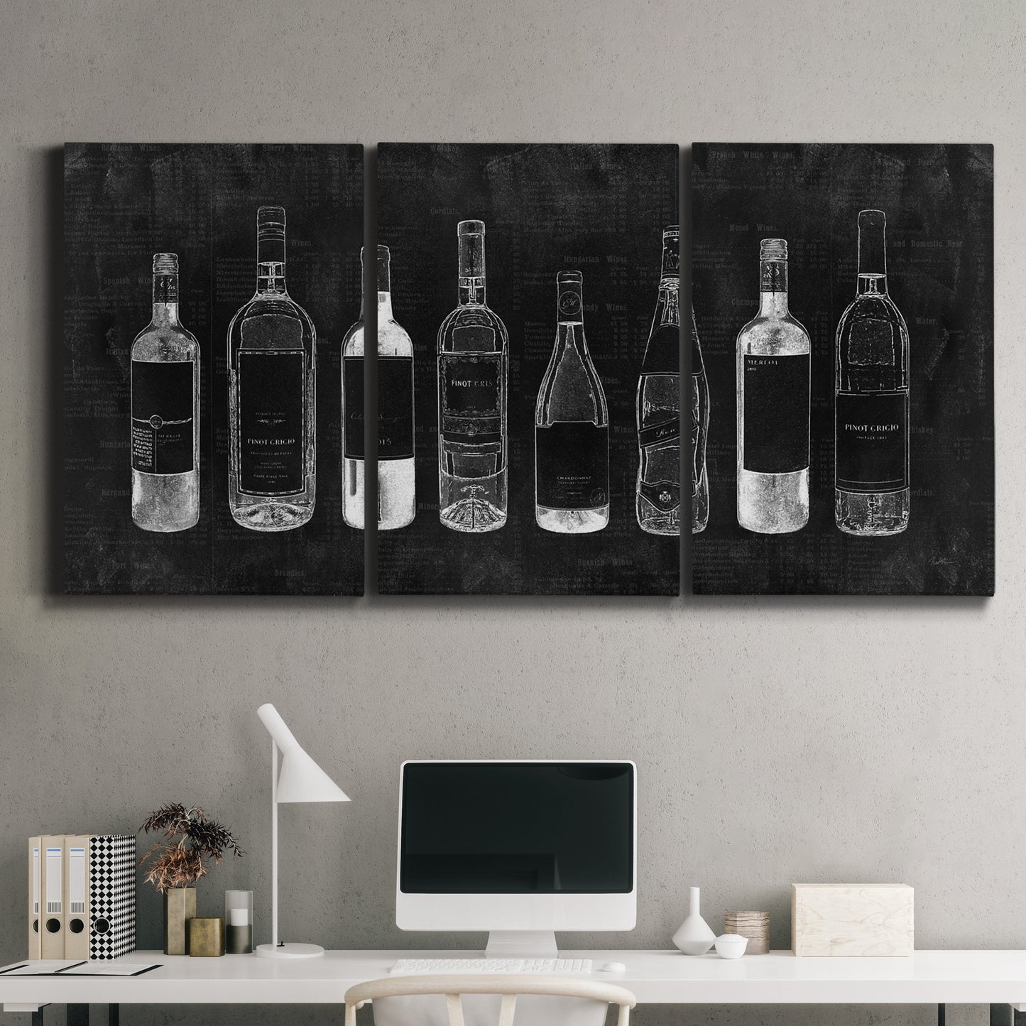 Three-panel canvas wall art featuring illustrated wine bottle cellar diagram, displayed above a desk in a home office.