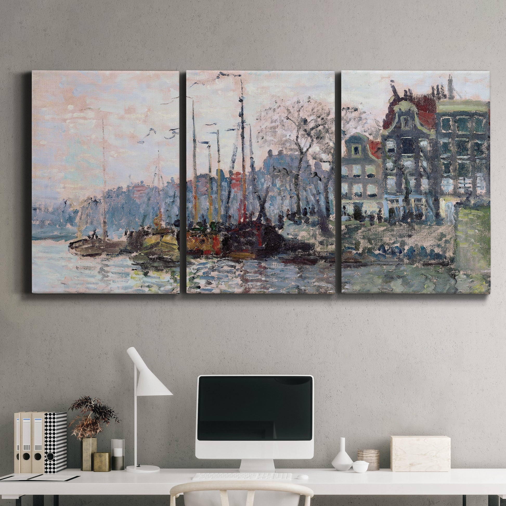 Three-panel canvas wall art featuring historic canal view with boats, displayed above a desk in a home office.