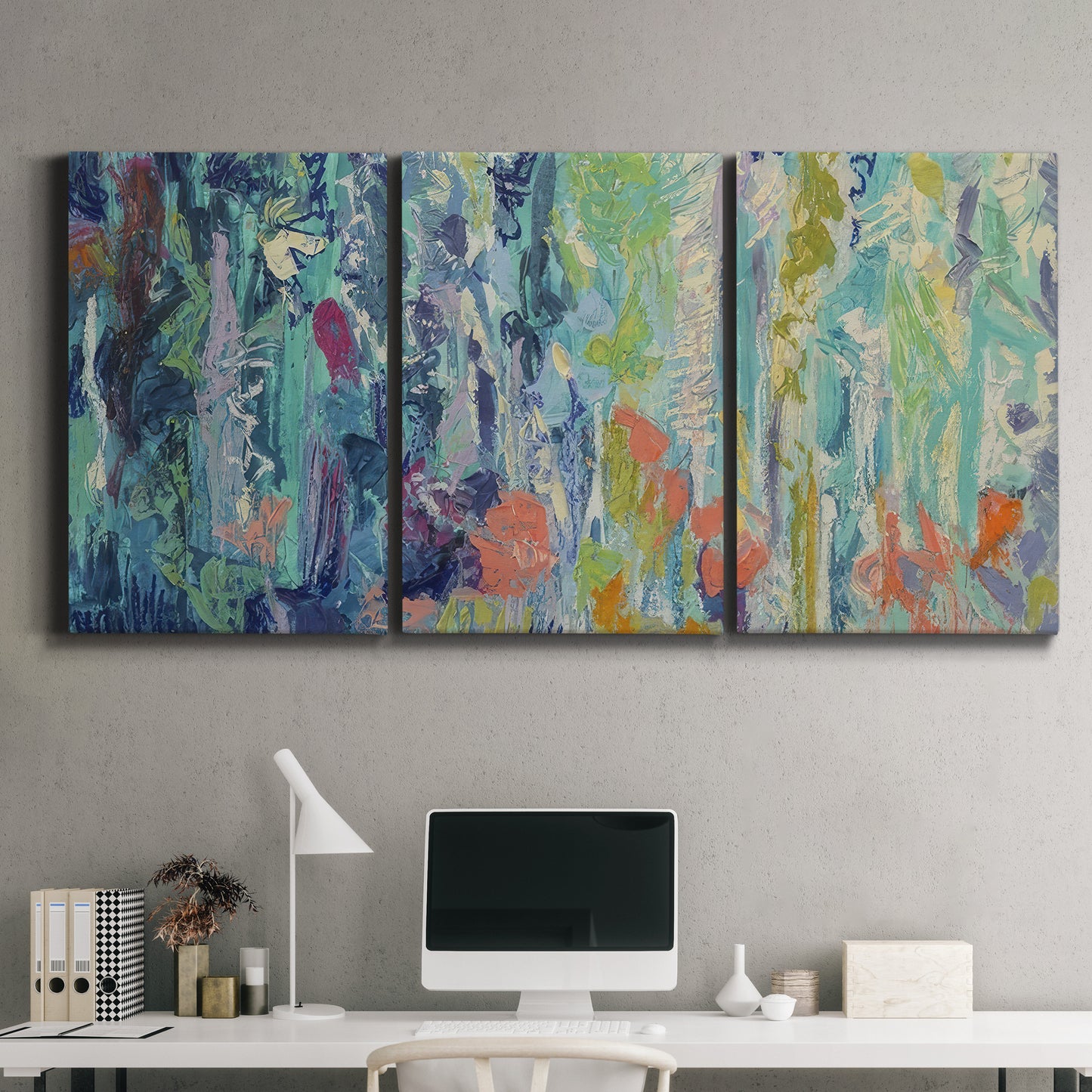 Three-panel canvas wall art featuring abstract rainfall with butterfly forms, displayed above a desk in a home office.