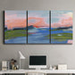 Three-panel canvas wall art featuring sunset reflections across calm sea, displayed above a desk in a home office.