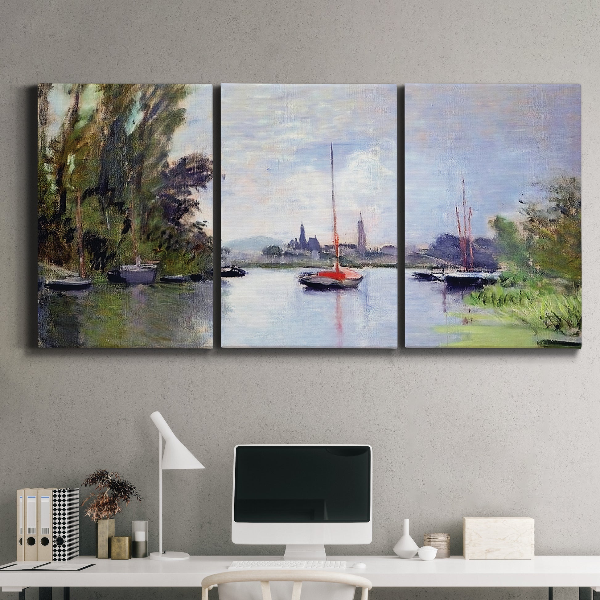Three-panel canvas wall art featuring river view with boats and reflections, displayed above a desk in a home office.