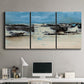 Three-panel canvas wall art featuring abstract bridge landscape in cyan, displayed above a desk in a home office.