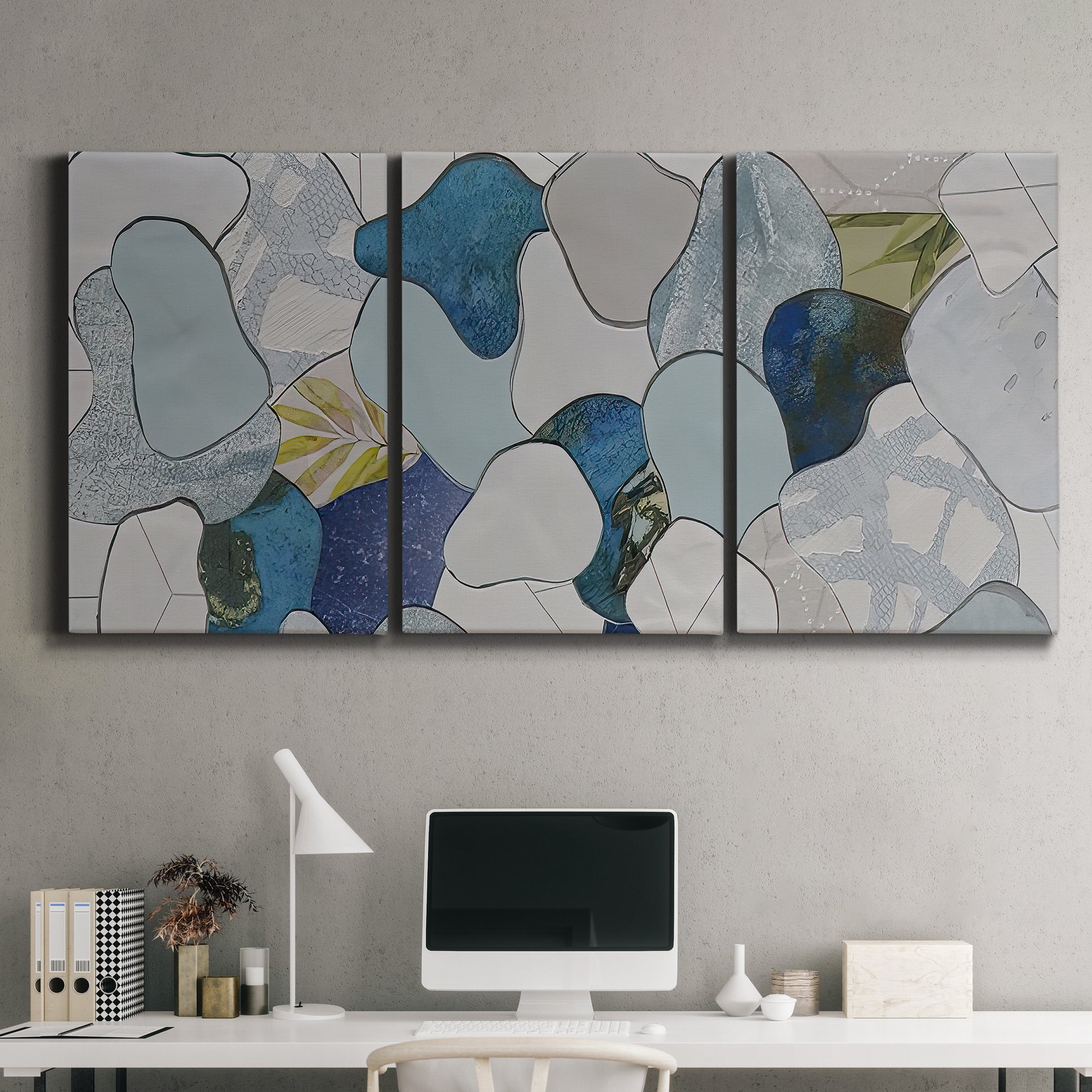 Three-panel canvas wall art featuring mid century geometric pink abstraction, displayed above a desk in a home office.