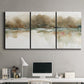 Three-panel canvas wall art featuring soft abstract mirrored reflections, displayed above a desk in a home office.