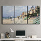 Three-panel canvas wall art featuring figures strolling along beach, displayed above a desk in a home office.