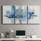 Three-panel canvas wall art featuring minimal urban skyline watercolor, displayed above a desk in a home office.