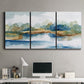 Three-panel canvas wall art featuring abstract blue watercolor landscape, displayed above a desk in a home office.