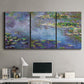 Three-panel canvas wall art featuring water lilies emerging through mist, displayed above a desk in a home office.
