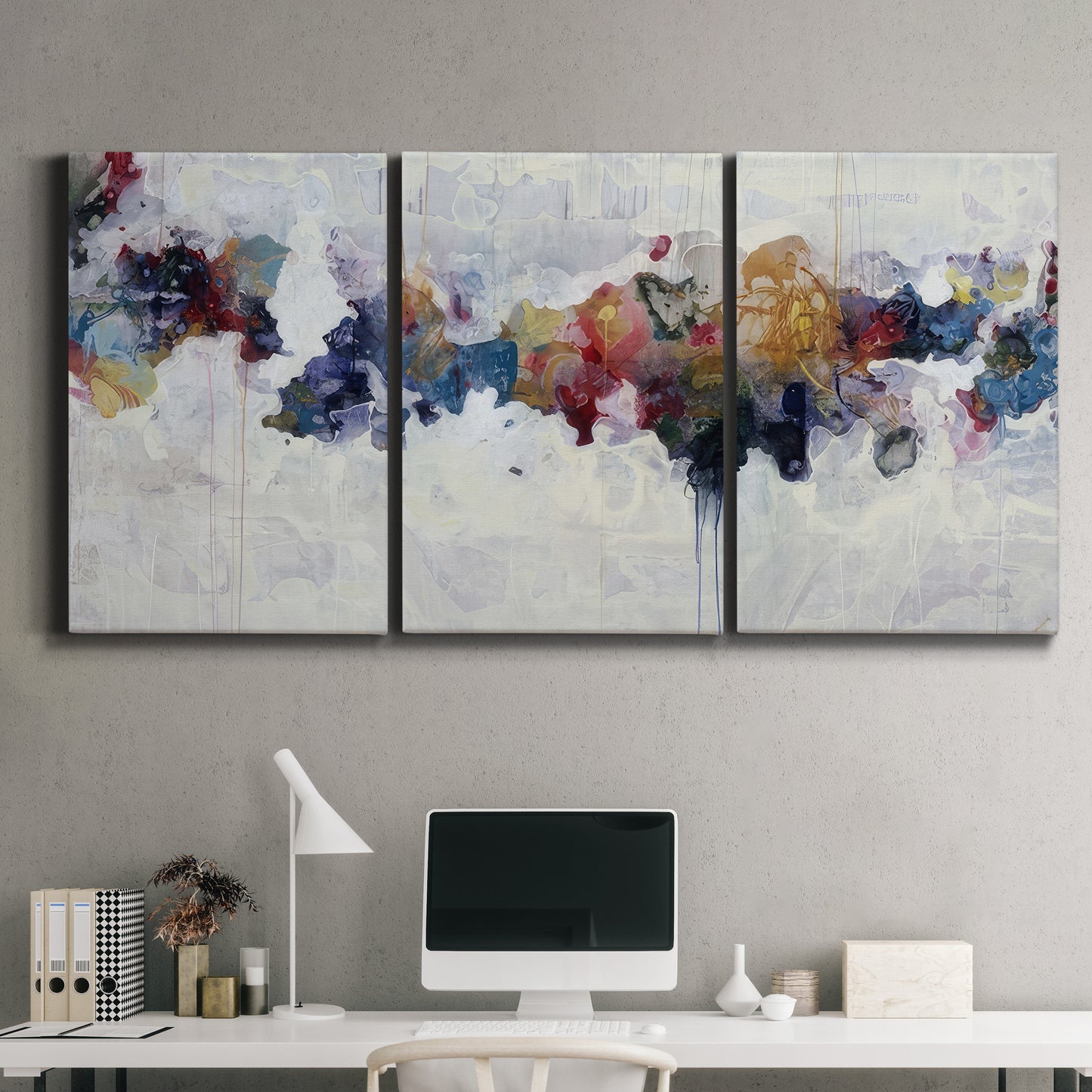 Three-panel canvas wall art featuring abstract water inspired composition, displayed above a desk in a home office.