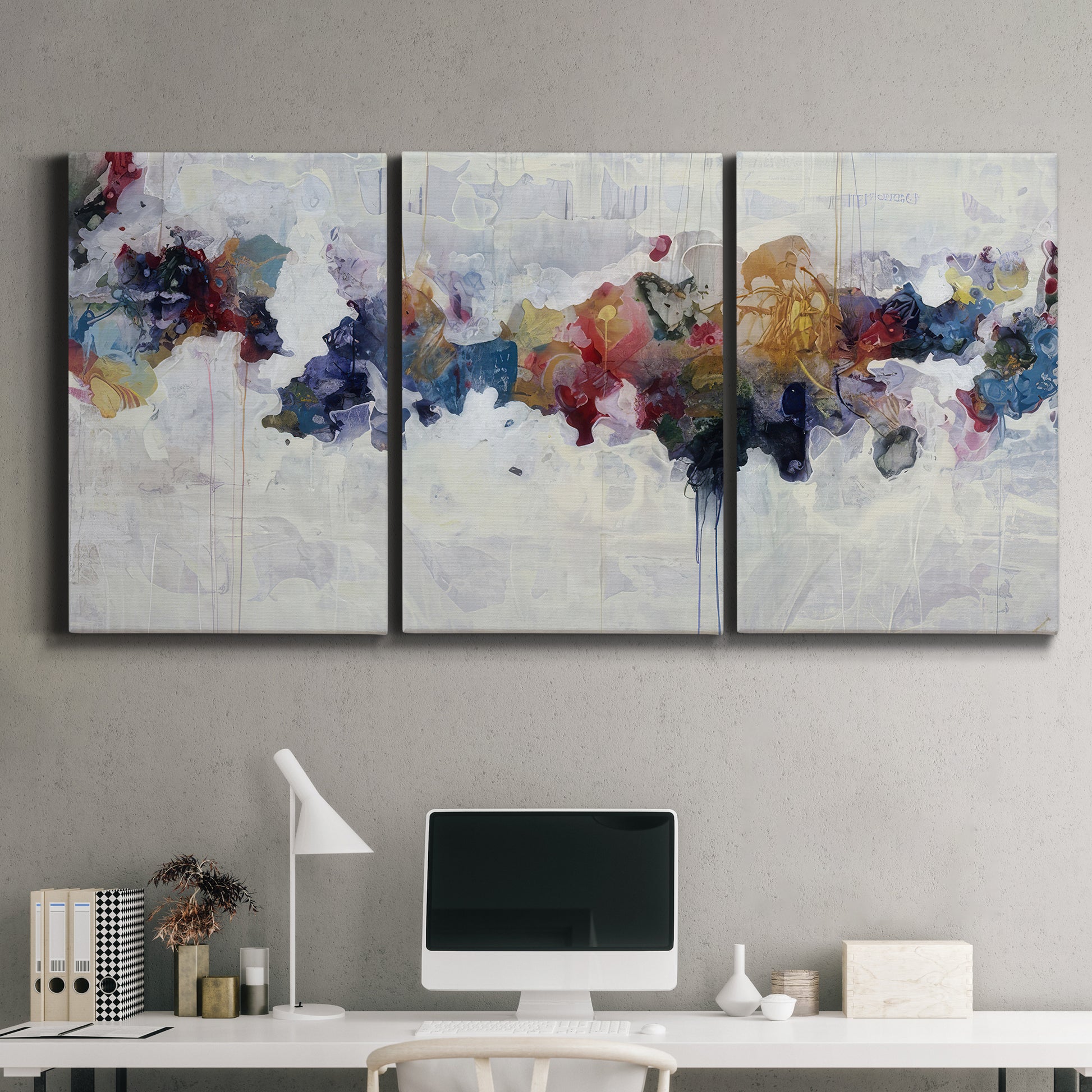 Three-panel canvas wall art featuring abstract water inspired composition, displayed above a desk in a home office.