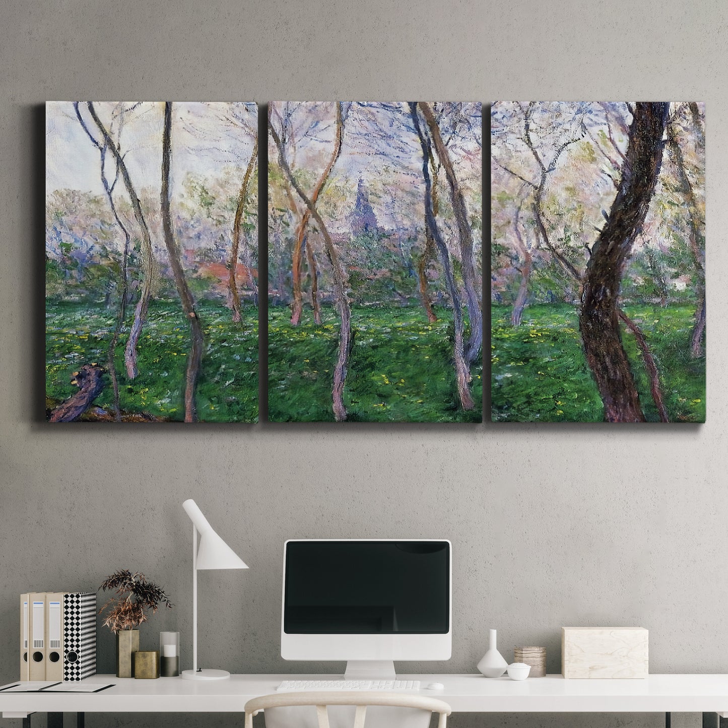 Three-panel canvas wall art featuring spring landscape along river, displayed above a desk in a home office.