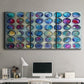 Three-panel canvas wall art featuring contrasting geometric abstract variations, displayed above a desk in a home office.