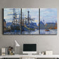 Three-panel canvas wall art featuring industrial dock along harbor, displayed above a desk in a home office.