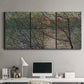 Three-panel canvas wall art featuring spring countryside with fresh foliage, displayed above a desk in a home office.