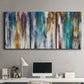 Three-panel canvas wall art featuring abstract shifting color forms, displayed above a desk in a home office.
