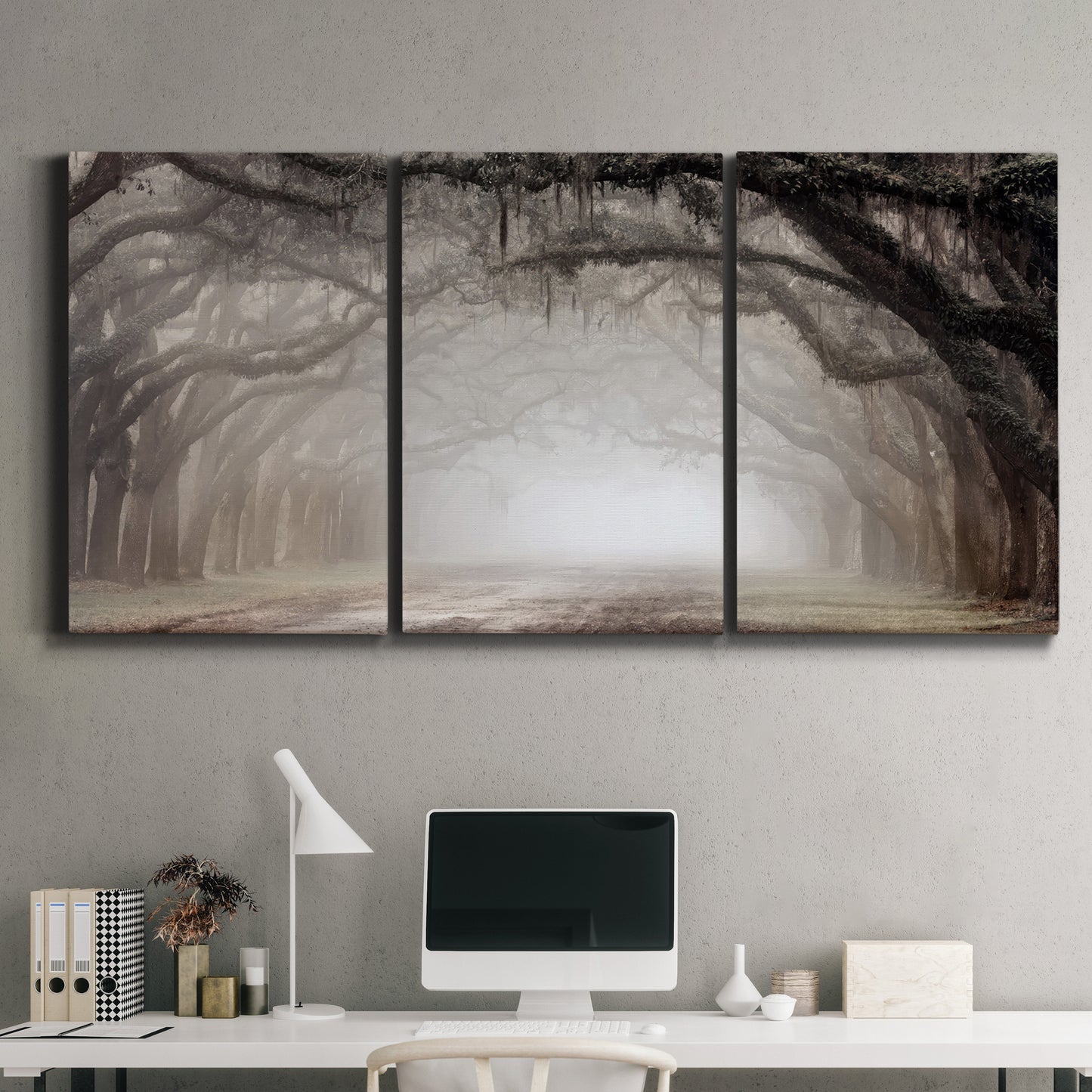 Three-panel canvas wall art featuring tree lined plantation road, displayed above a desk in a home office.