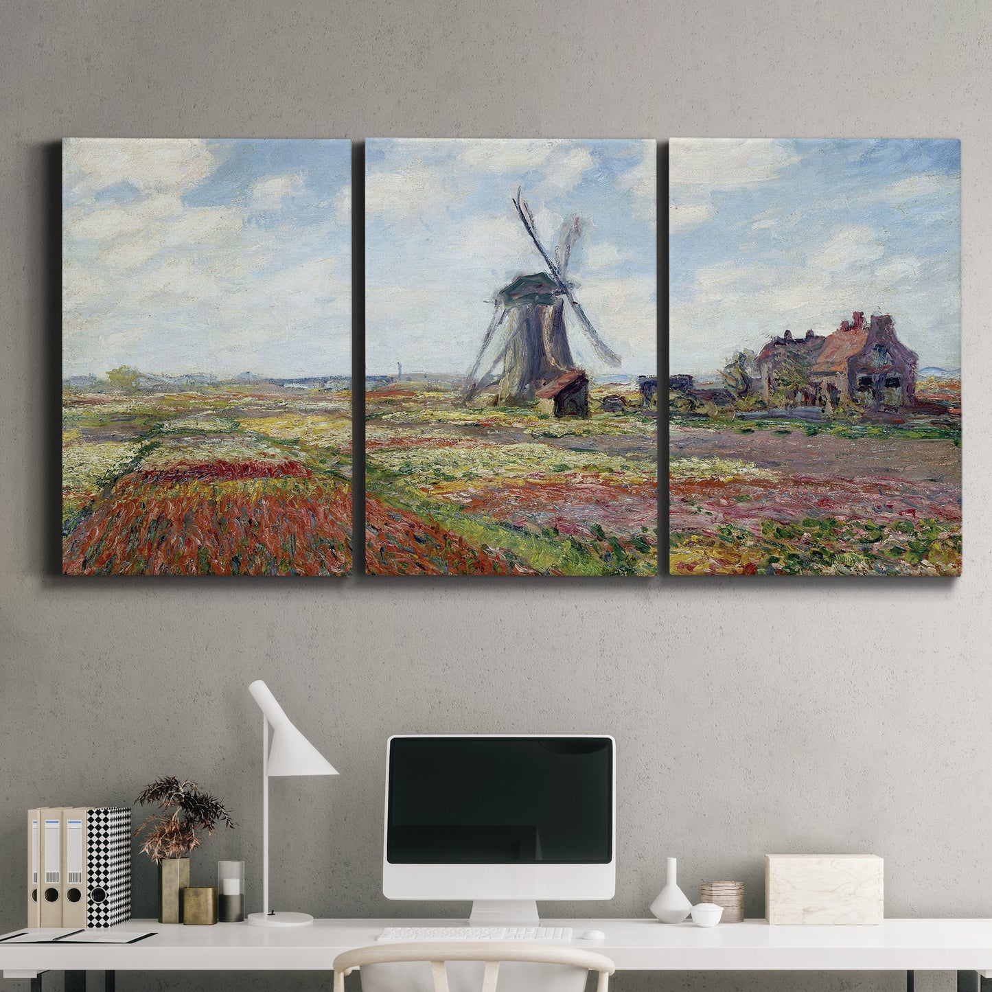 Three-panel canvas wall art featuring tulip fields with windmill, displayed above a desk in a home office.