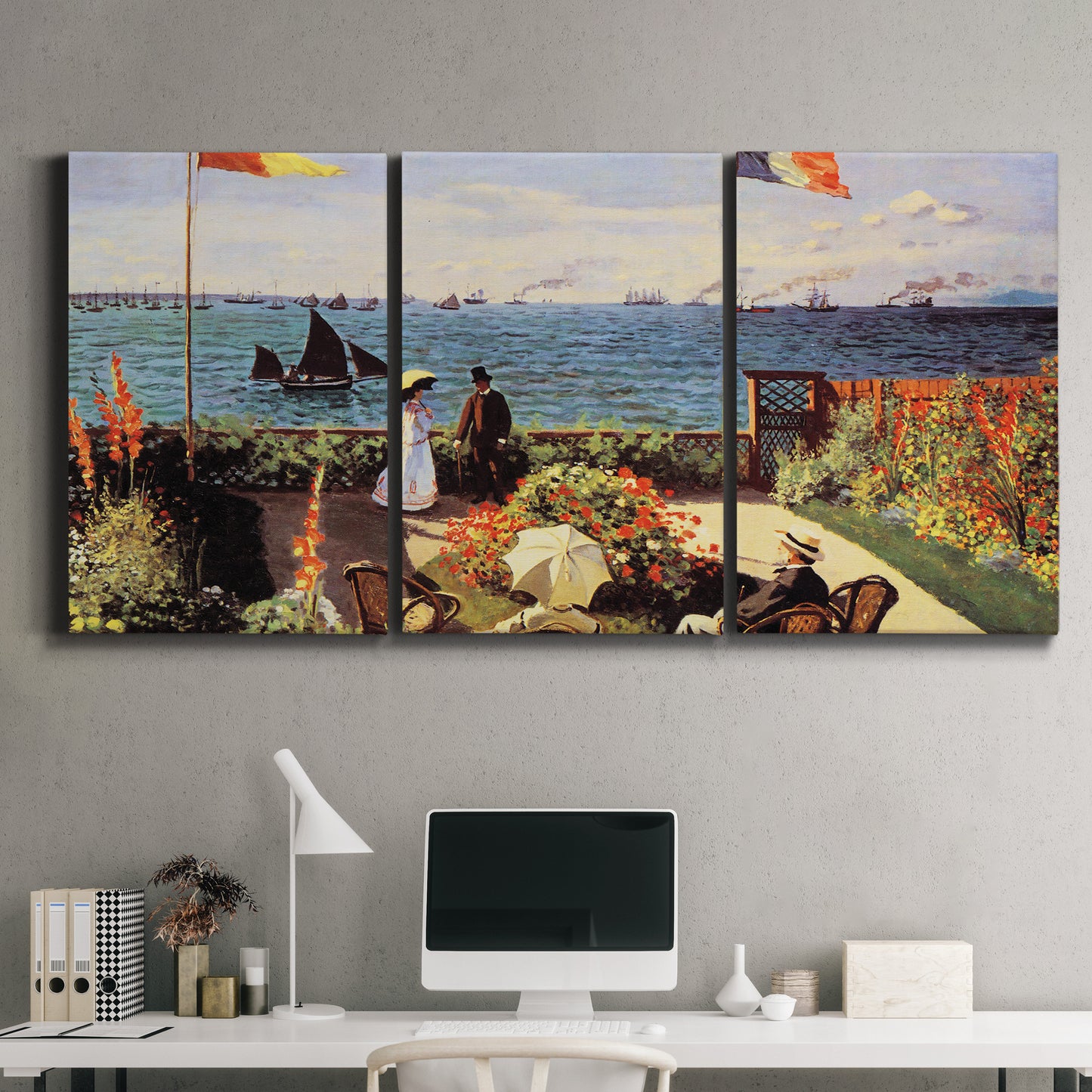 Three-panel canvas wall art featuring coastal garden overlooking sea, displayed above a desk in a home office.