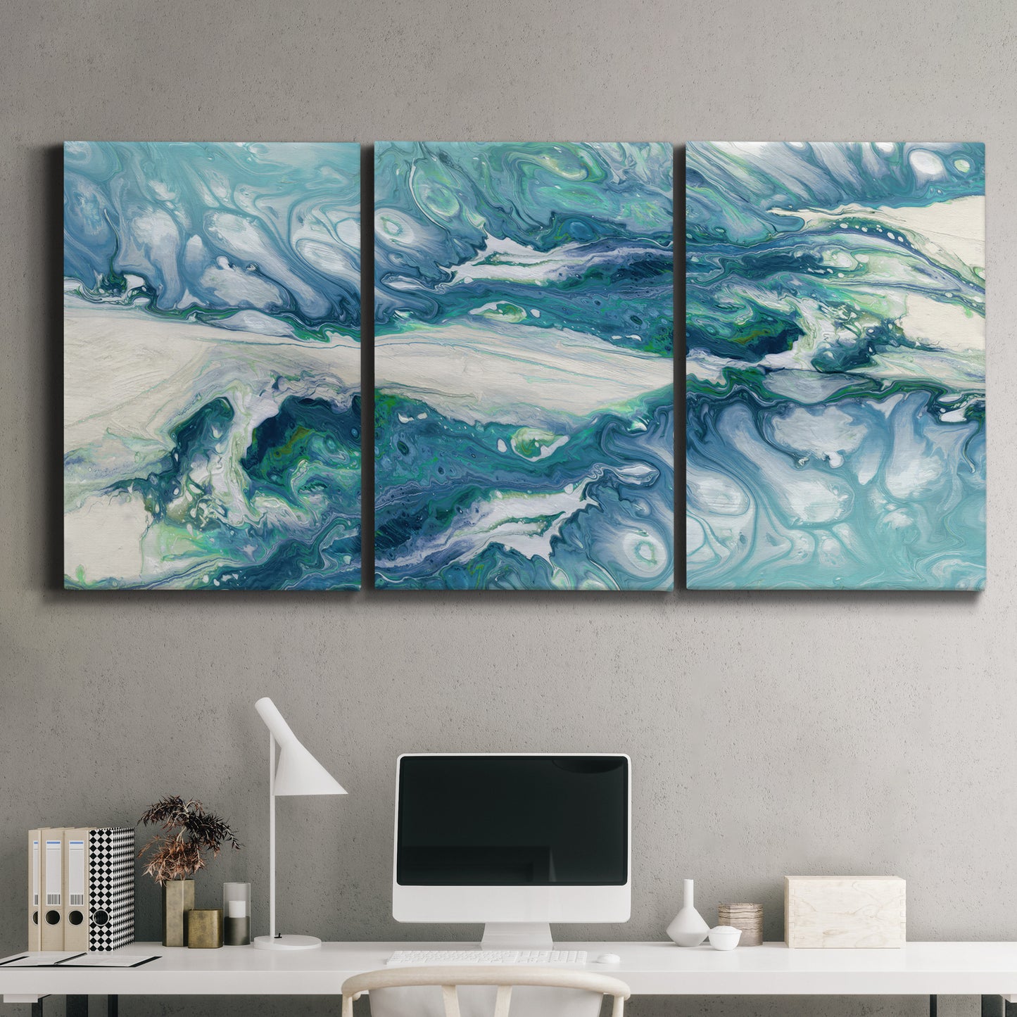 Three-panel canvas wall art featuring layered abstract marble textures, displayed above a desk in a home office.